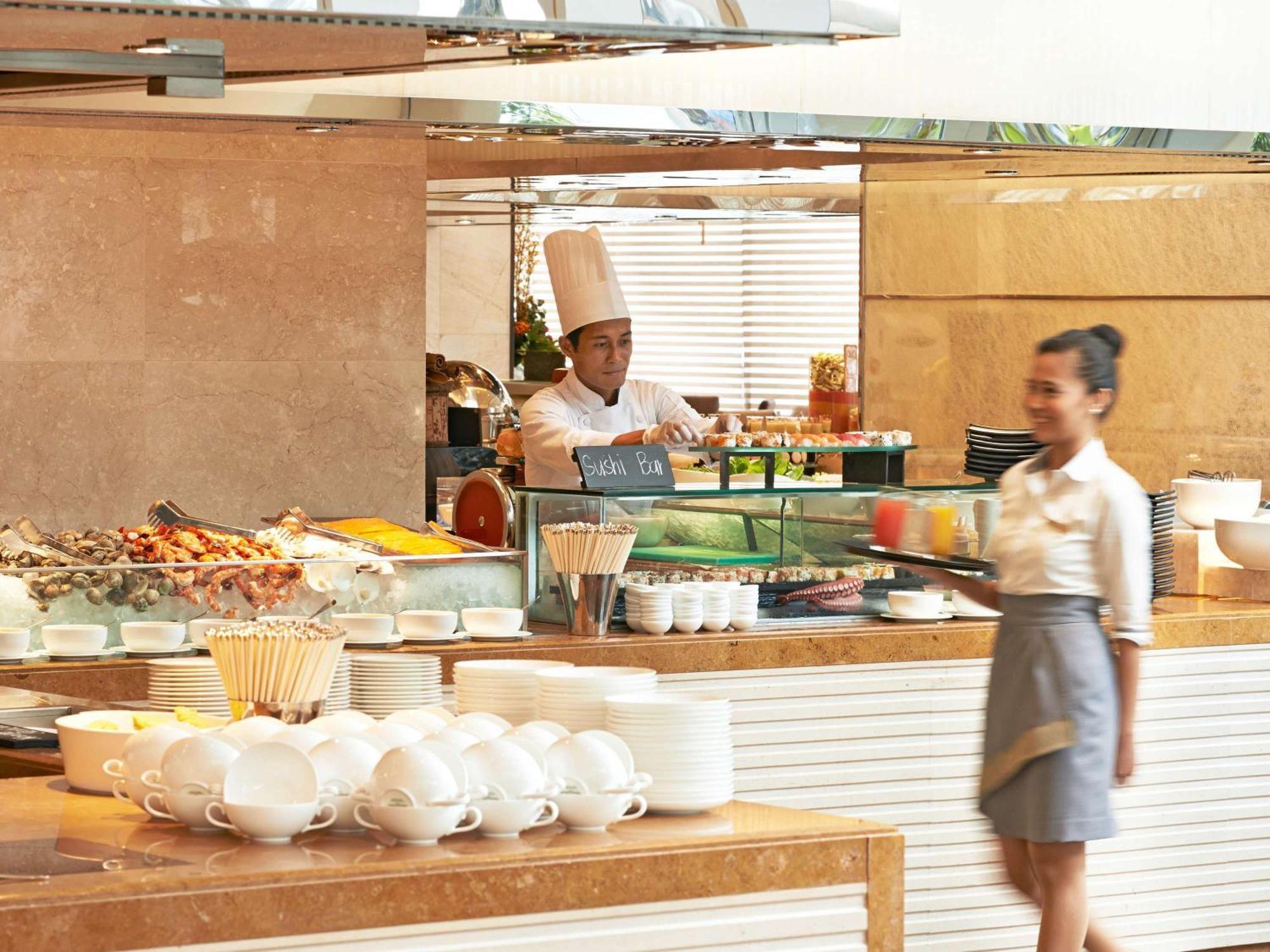 فندق فيرمونت ماكاتي المظهر الخارجي الصورة A restaurant in a hotel
